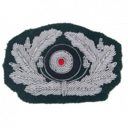 Wehrmacht officers cockade. Hand woven with metallic threads on dark green wool.