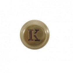 Green metal cockade with K monogram. 31 mm
